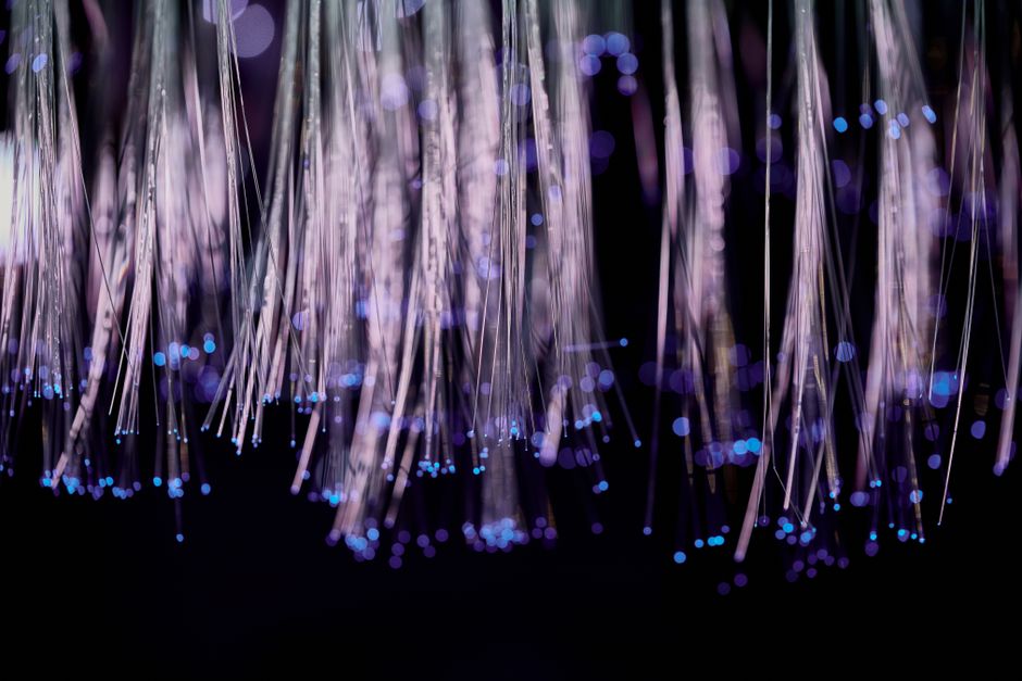 Glowing fiber optic lights in darkness