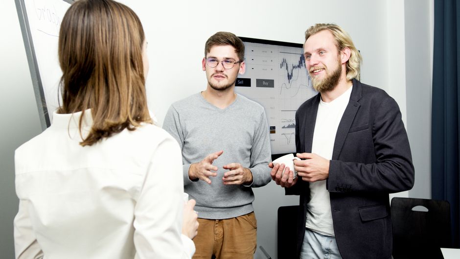 Professionals reviewing market data and trading activity