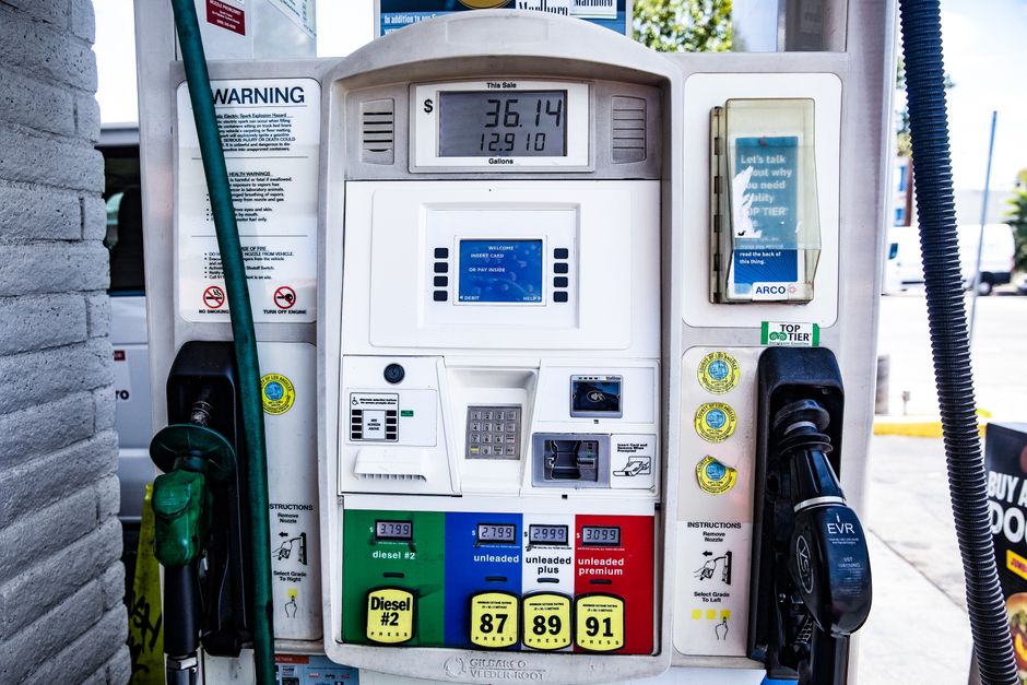Close-up of a fuel pump showing gasoline and diesel options at a gas station.