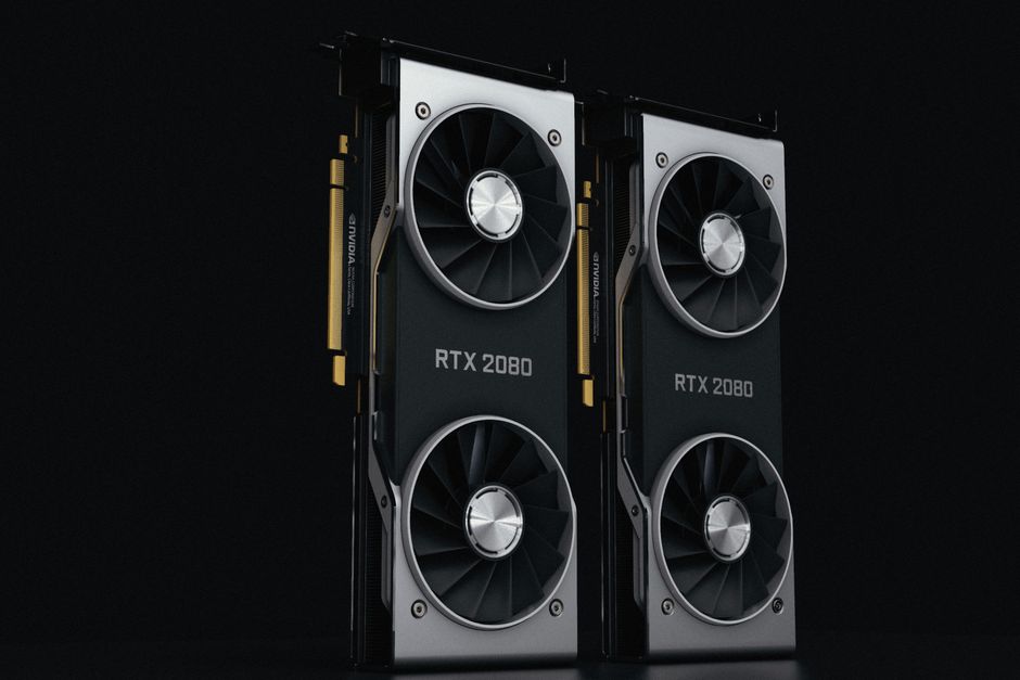 Close-up of two high-performance graphics cards with dual fans