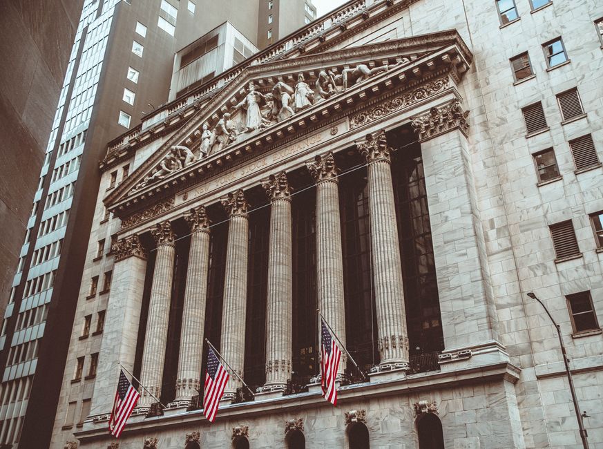 Historic New York Stock Exchange building facade with neoclassical architecture.