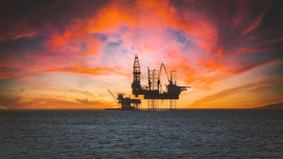 An offshore oil platform represents the energy-supply risk shaping the market rotation.