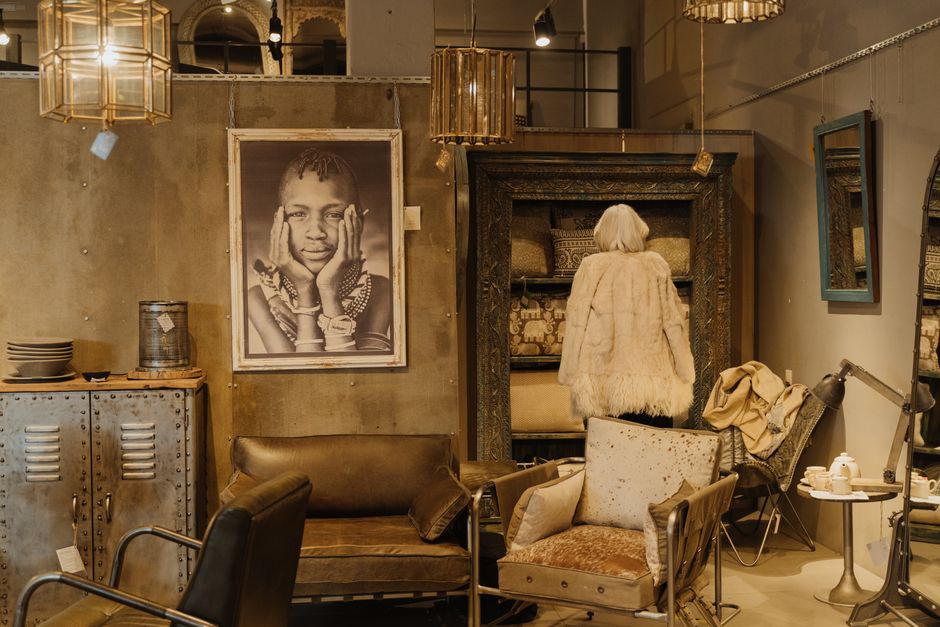 A premium furniture showroom arranged around home furnishings and decor.