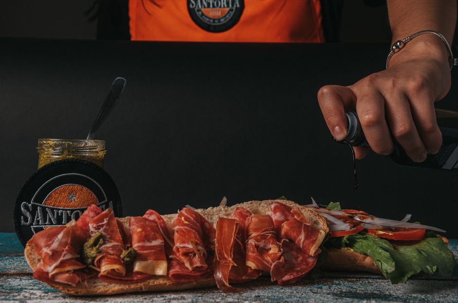 Gourmet sandwich being prepared