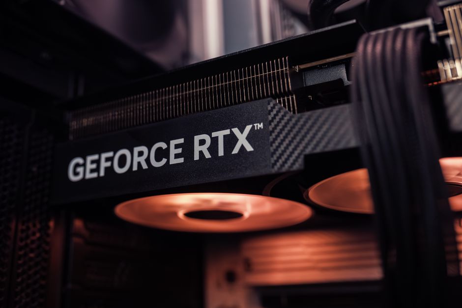 Graphics card glowing under warm lighting