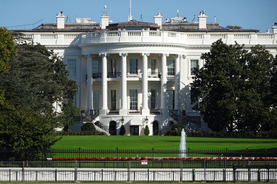 The White House in Washington, DC, seen from the front with its lawn and fountain