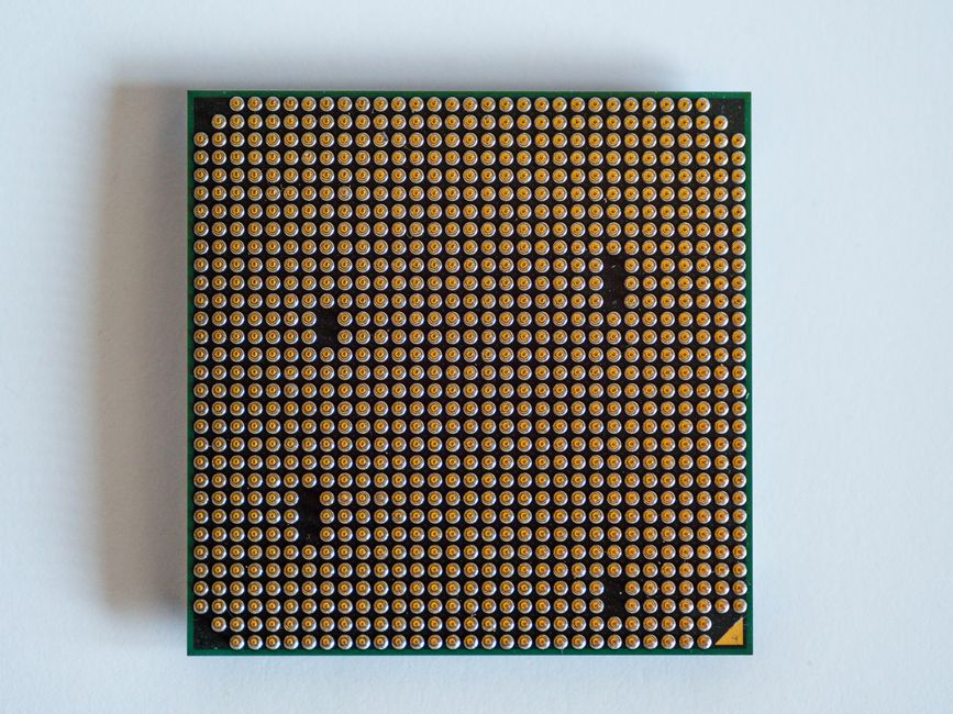 Close-up of a computer processor showcasing its pins