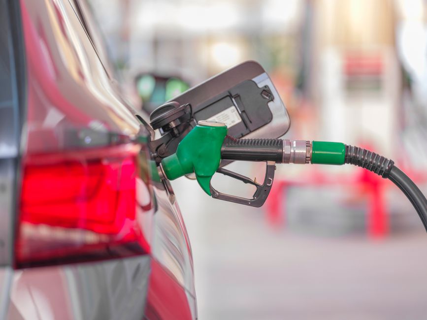 Fuel pump nozzle at gas station