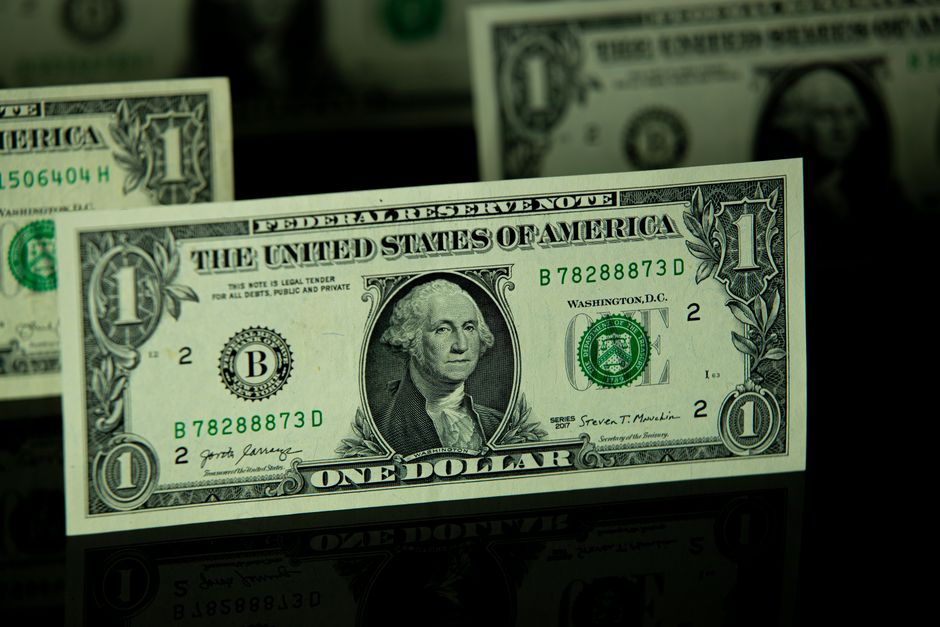 Close-up of a U.S. one dollar bill, symbolizing the Federal Reserve's rate decision and currency policy implications.