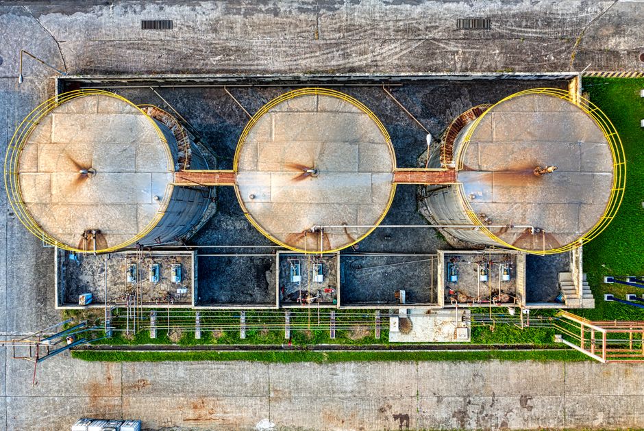 Industrial oil storage tanks at a refinery facility
