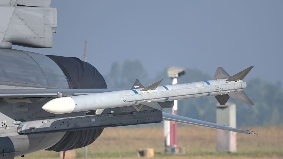 Military missile mounted on aircraft wing