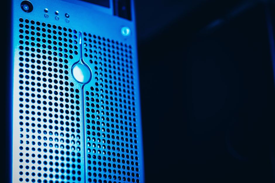 Blue-lit server racks in a modern data-center environment