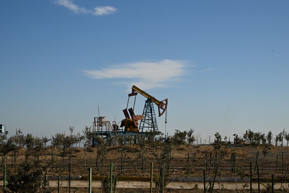 Oil pump jack in a dry landscape