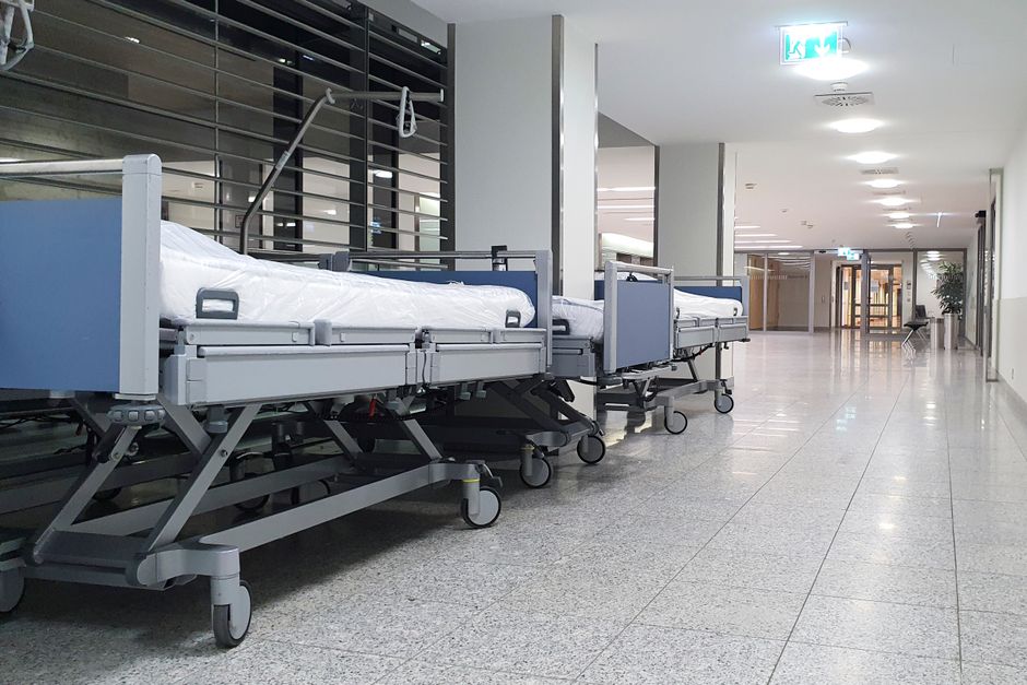 Empty hospital corridor with medical equipment