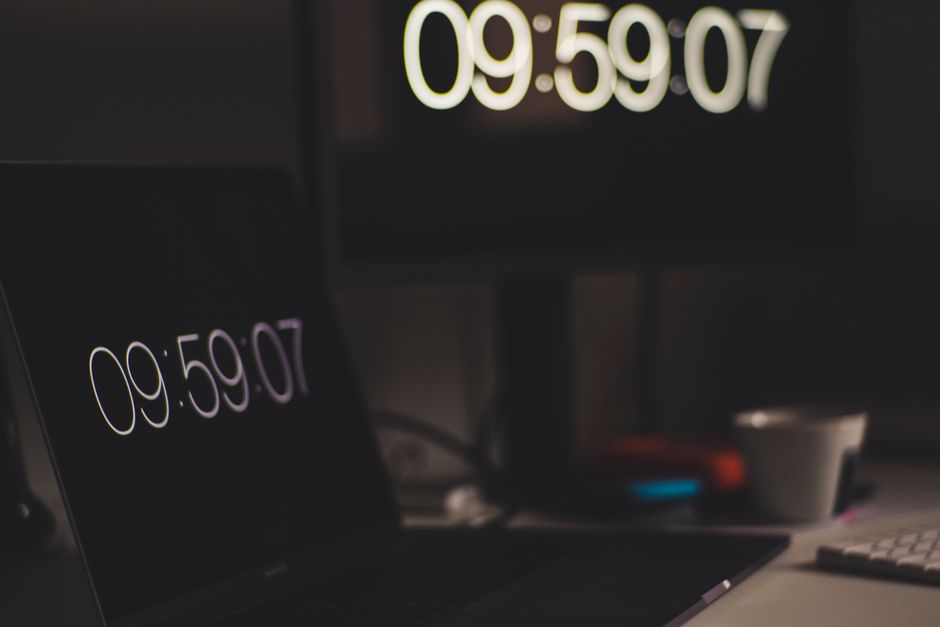 Two digital screens displaying a countdown timer at 09:59:07, emphasizing time-sensitive technology operations.
