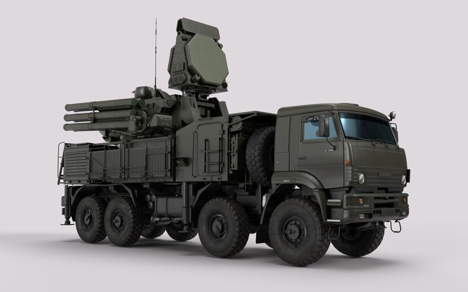 Military vehicle equipped with advanced radar and weaponry systems on display