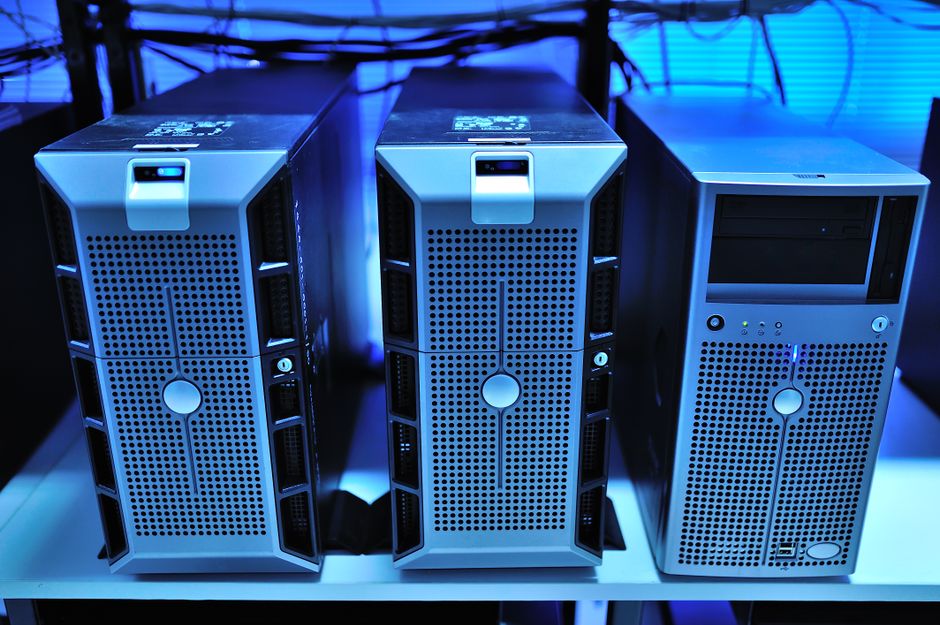 Close-up of modern rack-mounted server units in a data center.