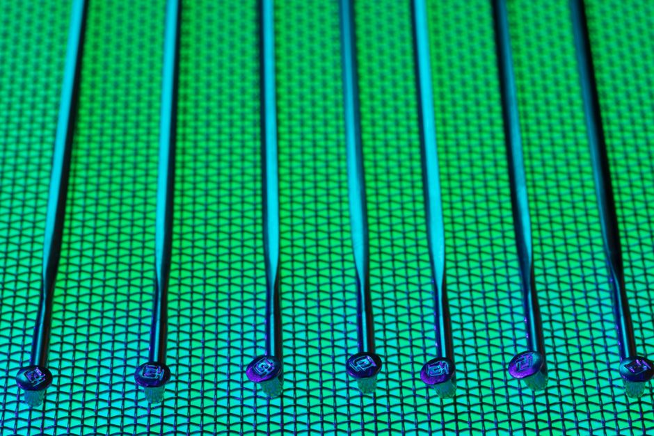 Close-up of colorful geometric spokes forming a circular pattern